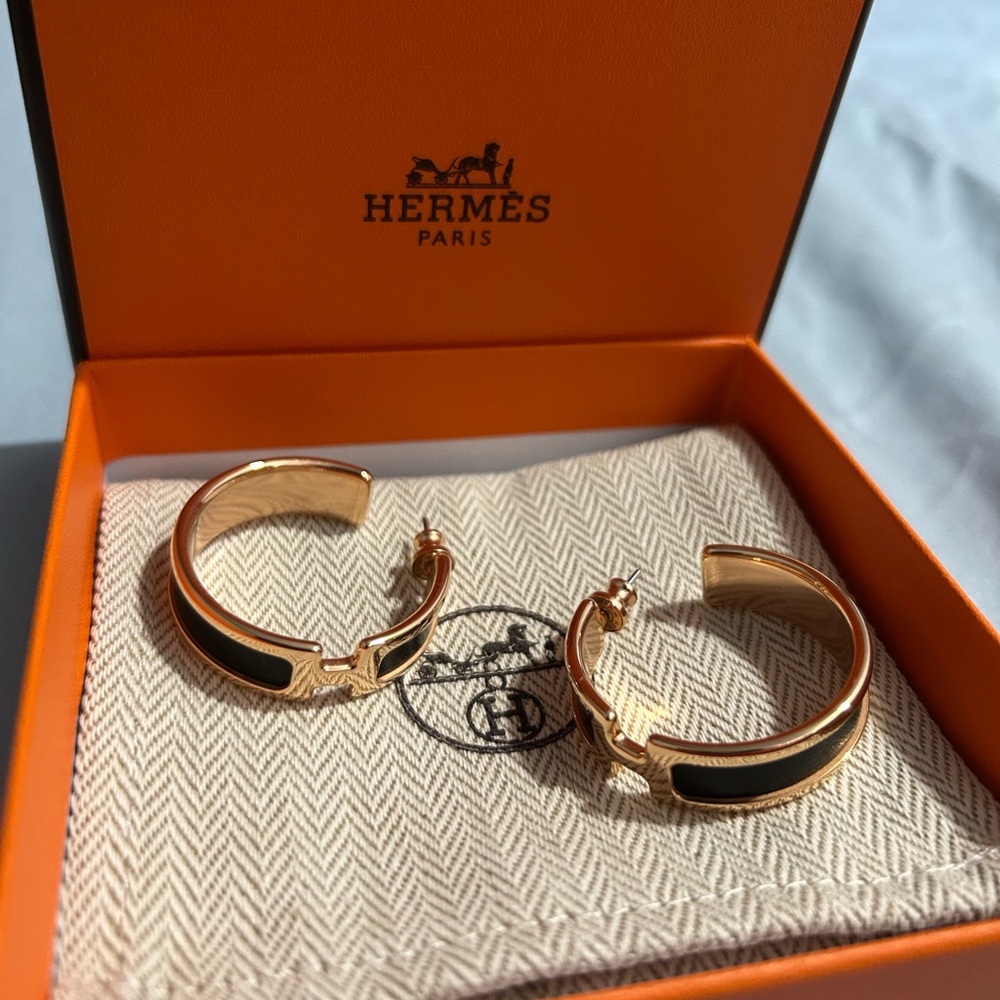 Brand new Hermes hoop earrings in black and gold